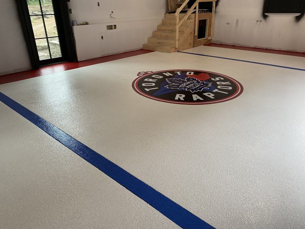 Epoxy-coated floor marked for indoor play