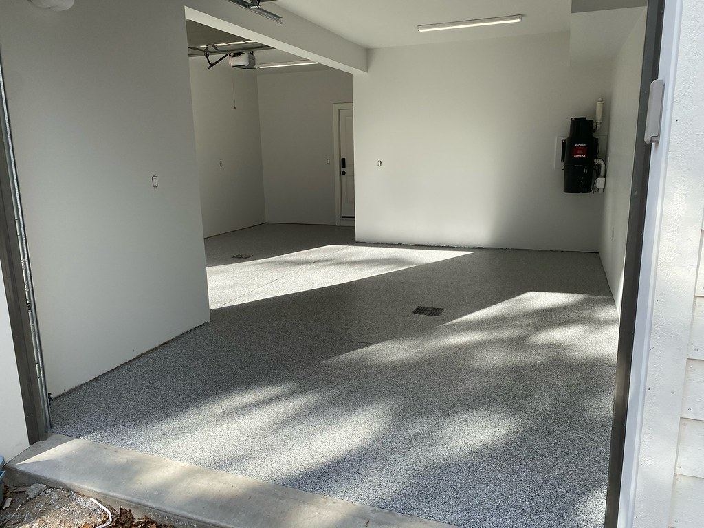 Solid-color epoxy coat on a garage floor