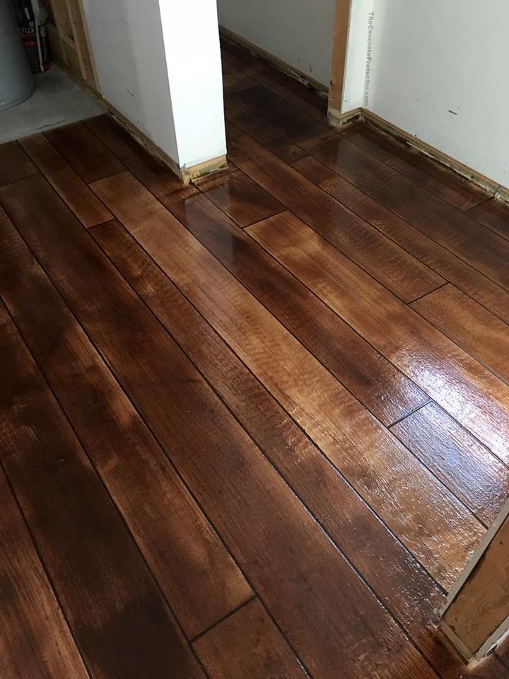 Wood-look coated concrete in a covered outdoor room